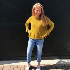 Madewell sweater with a split open back.